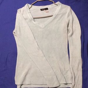 A fluffy sweater shirt... it’s a v neck